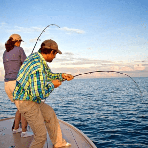 fisherman using a fly rod and a spinnning tackle rod in charlotte harbor